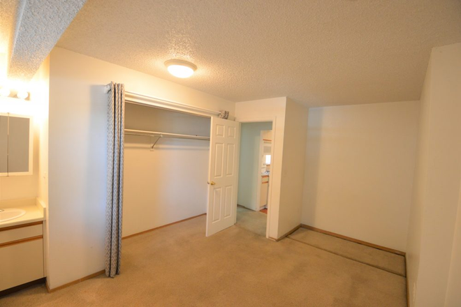 Bedroom, This is an old photo and it is hardwood floors now. - House on Marine st