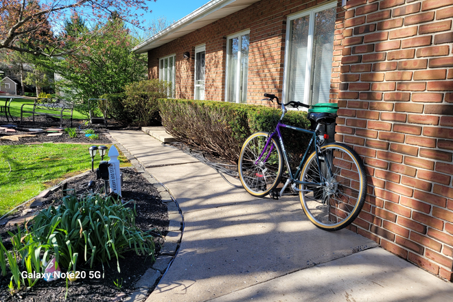 Walkway entrance showing available bicycle for commuting. - Private Furnished Family Room Bedroom in a Superior Tri-level house