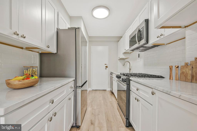 Kitchen - Fully Furnished Large Studio Unit - Walking Distance to AU Campus Condo