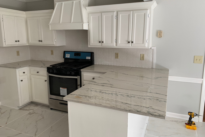 Kitchen - House in the Heart of Flowood: Where Comfort Meets Convenience