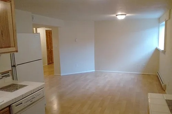 Livingroom from Kitchen - quite spacious - Private Entrance Basement Apartment | Price Reduced | Water, Parking & Laundry Included