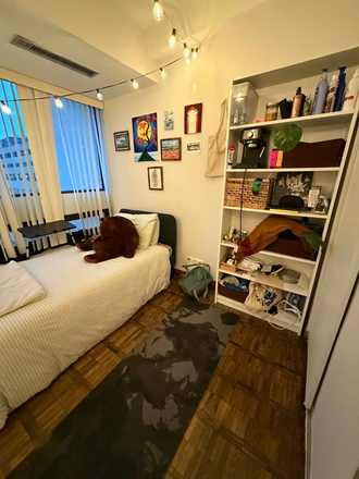 photo of room after furnishing - 1 furnished bedroom in a 2 bedroom apartment downtown
