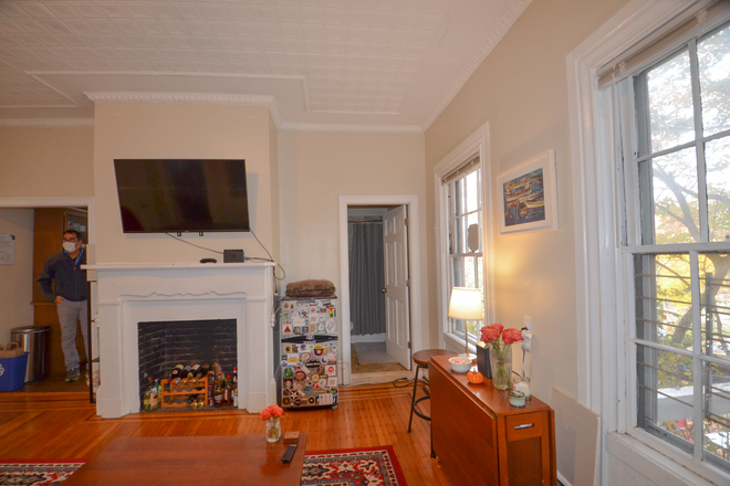 Living Room - Private Bedroom | Modern Living in College Hill! 4-Bedroom Apt at 40 Bowen St