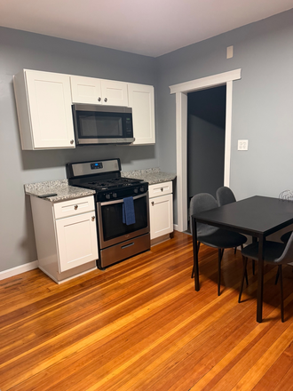 Full Eat-in kitchen - Fully Furnished Rooms Near UMass Boston-Utilities Included Triplex