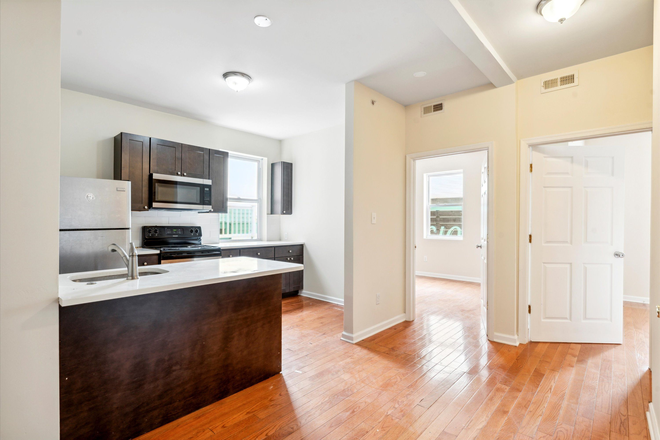 kitchen - The Mansion - Minutes from Campus with On-Site Basketball Court, Gazebo, Courtyard, Package Area Apartments