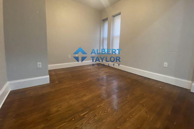 Living Room - Top-Floor 4 Bedroom on Sewall!! Central AC & Free laundry!!