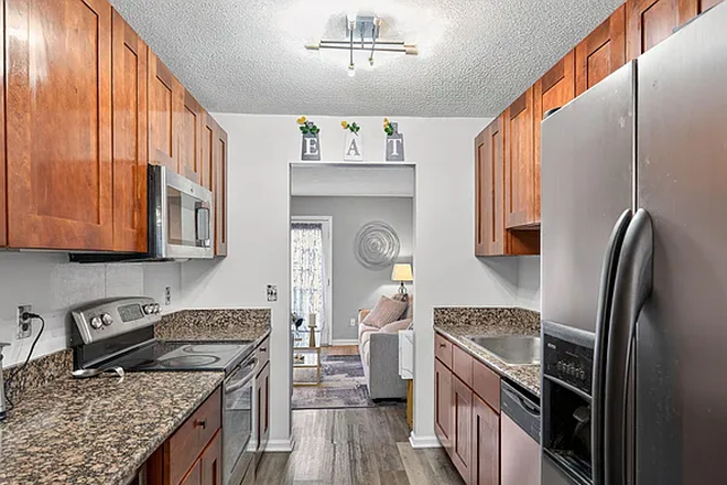 Kitchen with granite countertops - 3 Bedroom 2.5 Bath Townhouse with Private Backyard!