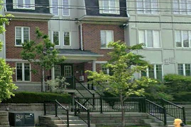 Street view - 3 bedroom condo, 2 bathrooms (one is en-suite), plus den. WHOLE UNIT FOR RE