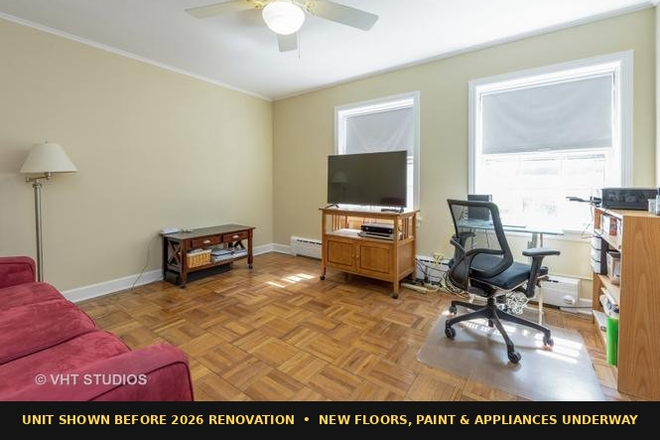 Bedroom 2 (pre reno) - Remodeled 2BR near NU & Lake: New Floors + Appliances, Heat, Water & Garage Parking Incl. $2,350