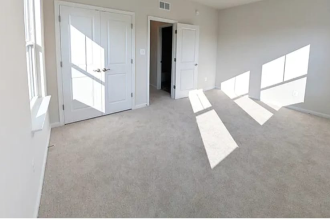 Main Floor Bedroom View 2 - Room Rental Townhome