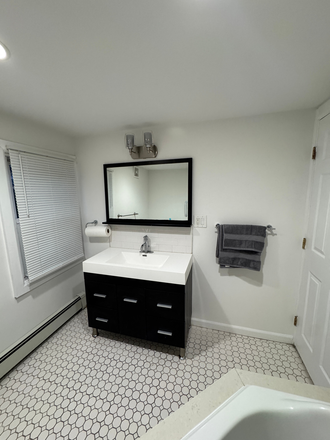 Bathroom - Maplewood Rare 2-bedroom duplex with parking, outdoor space, and flexible bonus areas Duplex