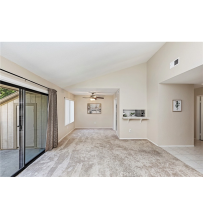 Dining room/livingroom - 1.4 miles from UCR. Quiet relaxing escape with pool Condo