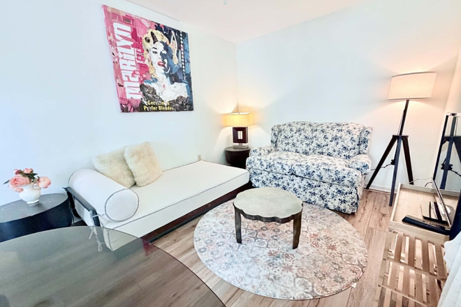 Living Room with a TV - 1b1b "Fully Furnished All bills included Pet Friendly" long/short term Apartments