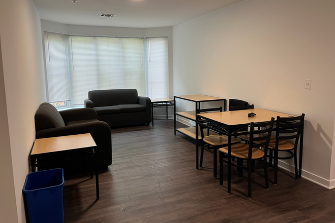 Living Room - Bedroom in South Campus Commons 6 4BR 2B