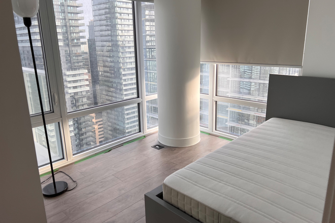 Available Bedroom - 1 Bedroom in Sunny 3-bedroom condo on Yonge