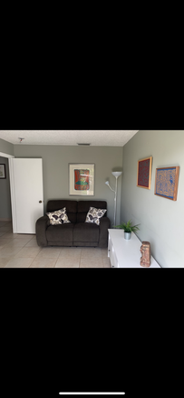Den Entrance w/ electric recliner - Walk to FIU- Main Campus! New 1 Bed all included Private Suite. House