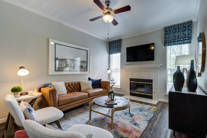 Living Room - Welcome to your new home at Irving Schoolhouse Apartments!