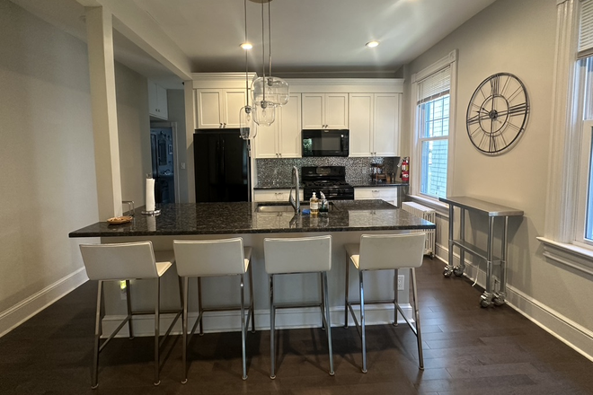 Fully stocked kitchen and 4-seater island - Furnished 1BR Condo-Park Place-Princeton