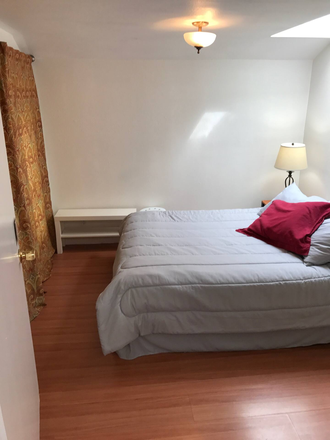 Bedroom - updated skylight & furnished with queen size bed - Sunny Tranquil 1 Bedroom / 1 Bath Backyard Cottage for Rent Apartments