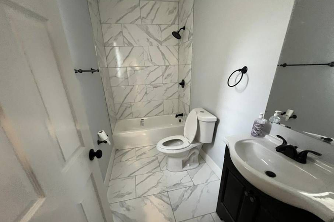 First Floor Bathroom - Newly Remodeled 5 bed 2 bath with Amazing Finishes House