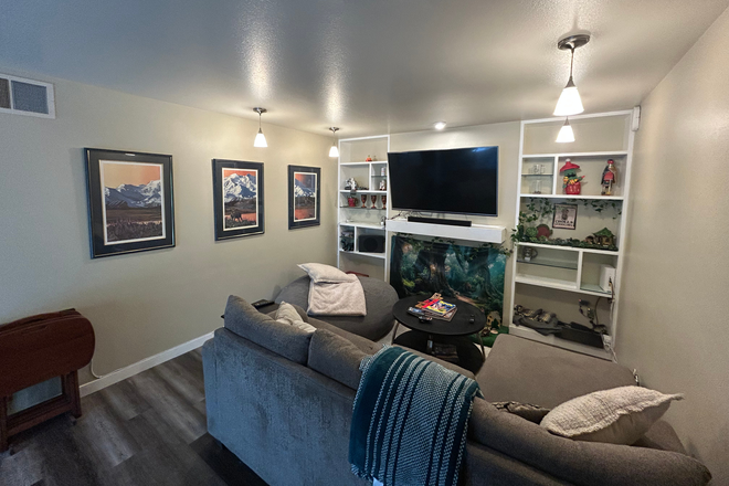 The living room/den area - Private Rooms in Spacious 1,850 sq. ft. Condo on Foothill Drive ($630-$650)