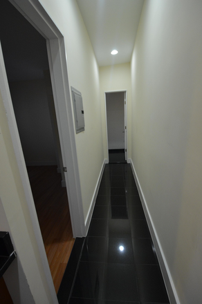 Hallway - 3 bed 1 bath on Peterborough St - Modern Unit with Brick Walls! Apartments