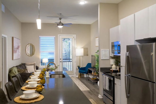 Kitchen In Unit - Best Buddies Living/ The Met Gainesville Apartments