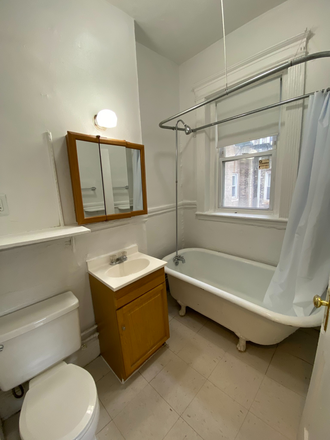 Hub Realty - Handy front facing one bedroom split with decorative fireplace, in Allston Apartments