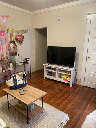 Living room - 4 BR 2 Bath apartment 1 block from Campus