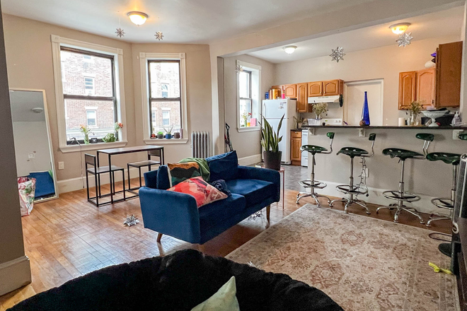 OPEN CONCEPT Living Room/Kitchen - 1066 Commonwealth Ave - Huge bedrooms, updated kitchen, seconds from Babcock T stop & Star Market! Apartments