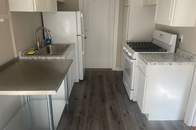 kitchen - No feeFantastic condo in a charming building, roof deck, heat included.