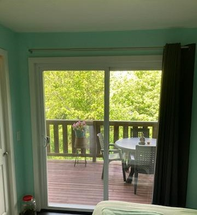 bedroom rear deck - 5 minutes to Bay Campus, 15 Minutes to Main Campus, North End Near Bonnet Shores Condo