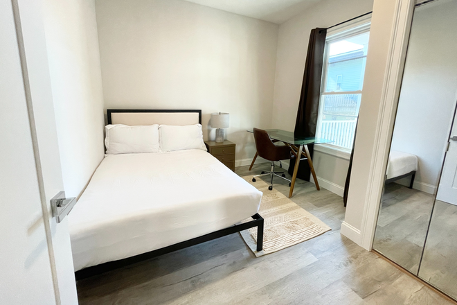 Bedroom - Gorgeous newly renovated 5-bedroom, 2-bath apartment on Newport St in Dorchester.
