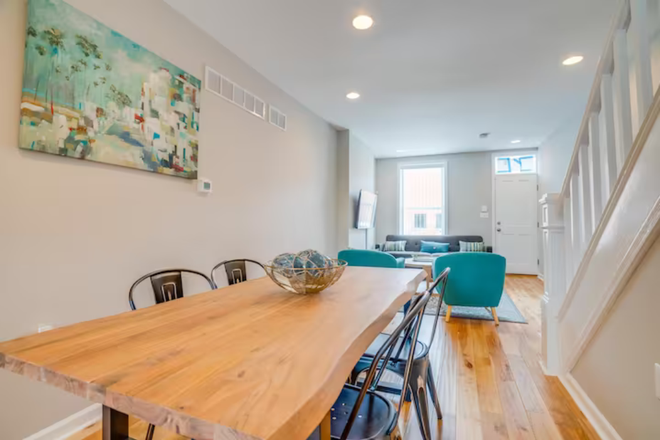 Dining area - Four Blocks from Hopkins: Enjoy Furnished Living, Without Parking Worries Townhome