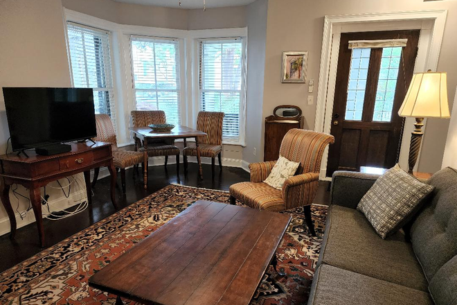 Living room and front door - Beautiful large ONE bedroom apartment, Rutledge Ave, All inclusive off street parking.