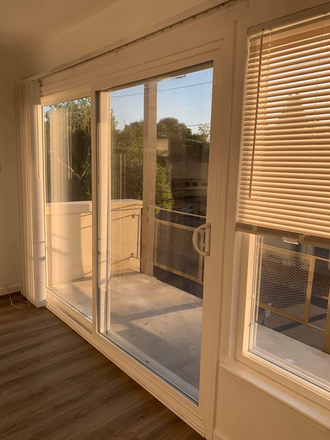 Balcony in sunset - Sunny top-floor unit for rent!
