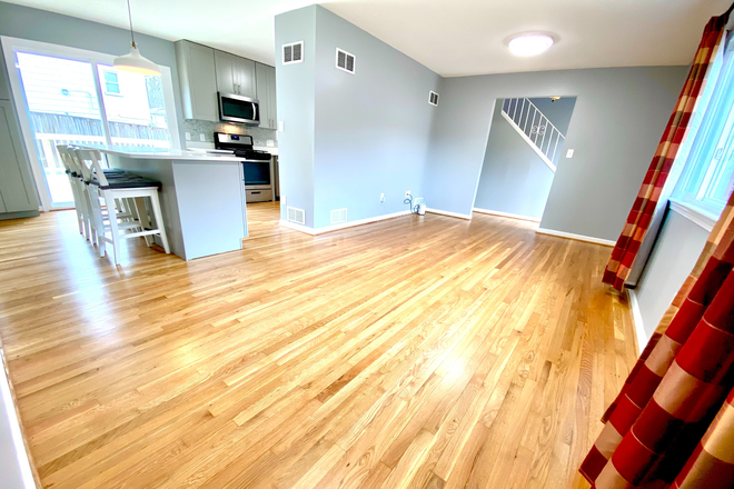 Enormous living room! - FANTASTIC 5-BEDROOM, HUGE NEW KITCHEN, DESIGNER BATHS, GLEAMING HARDWOODS, GIANT DECK. AUGUST 2026! House