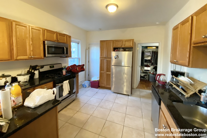 Kitchen - Spacious 4-bed, 1-bath with in-unit Washer/Dryer! Avail. 9/1/25! Apartments