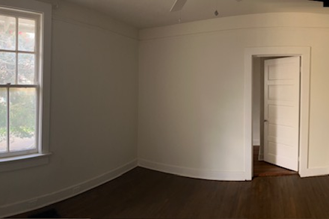 One of the bedrooms. Large closet space - Newly Renovated Property Close to Campus Triplex