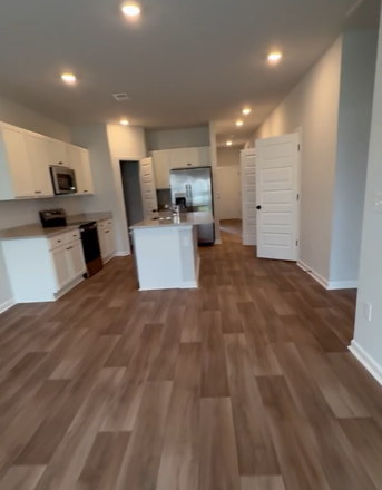 Kitchen - Beautiful new 3 bed/ 3 full baths, washer /dryer, refrigerator, garage , all new blind Townhome