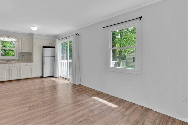 Living room - One Bedroom apartment in desirable location with private deck