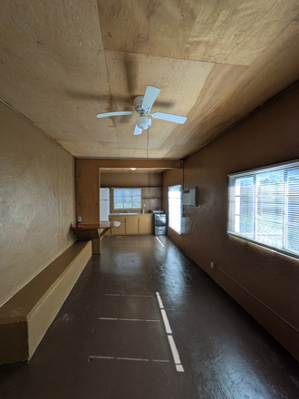 Living Room - with open kitchen and breakfast bar - Intown Dahlonega - Walk/Bike to Campus - Unique 1BR/1BA Apartment