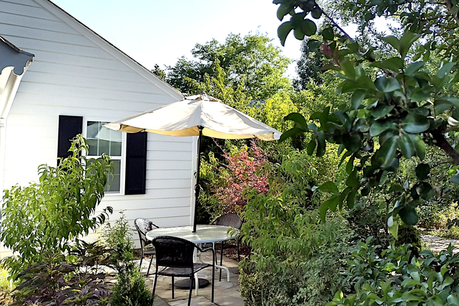 One of the patios - Peaceful room in family house near Grounds