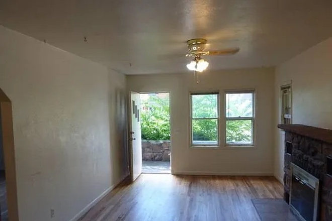 Living room - Location-central to campus and Pearl Street Mall. Townhome