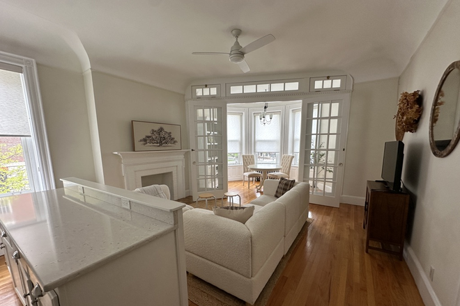 Living Room - Stunning Corner Unit on Comm Ave | All Utilities Incl. | Flexible Lease | Furnished or Unfurnished Condo
