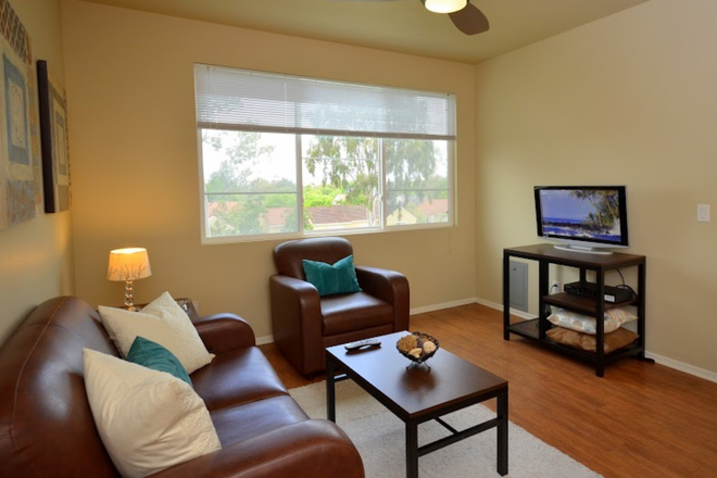 Example of the living room - PUERTA DEL SOL 2 BED 2 BATH SHARED UNIT Apartments