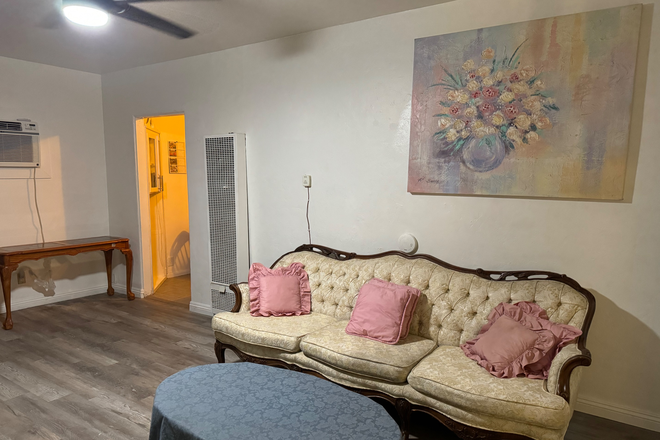 Sofa in the living room - Fully Furnished 2BR/1Ba quiet culdesac house, walking distance to vibrant Mission Inn, DT Riv