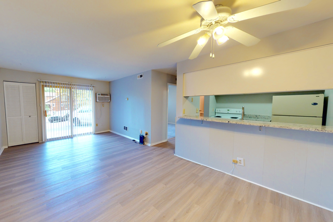 Open Concept Living Room - Deck Haus - 2971 Deckebach Avenue Apartments