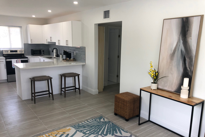 Living Room & Kitchen - *Newly Renovated* 2 Bedroom near Marlins Stadium Apartments