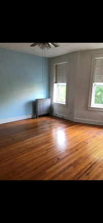 Front room (recently received fresh coat of white paint) - Large one bedroom apartment